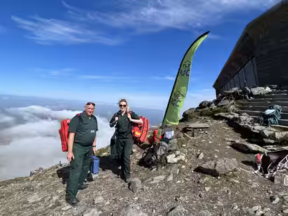Medic 1 responders preparing equipment at an outdoor event